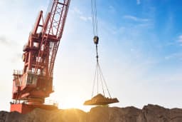 crane moving dirt