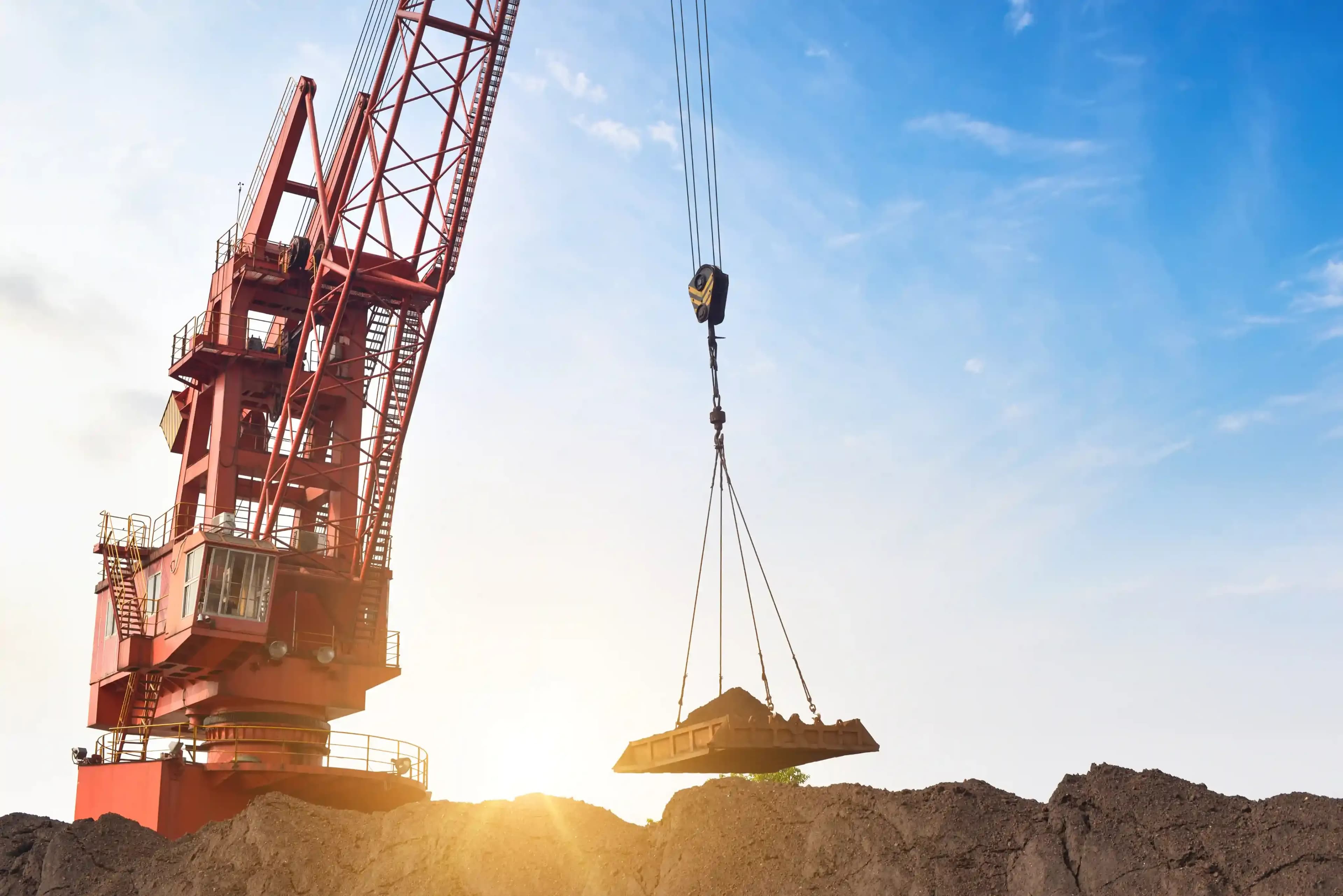 crane moving dirt